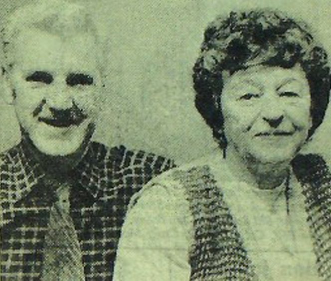 smiling Samuel and Margaret Thomson sit side by side