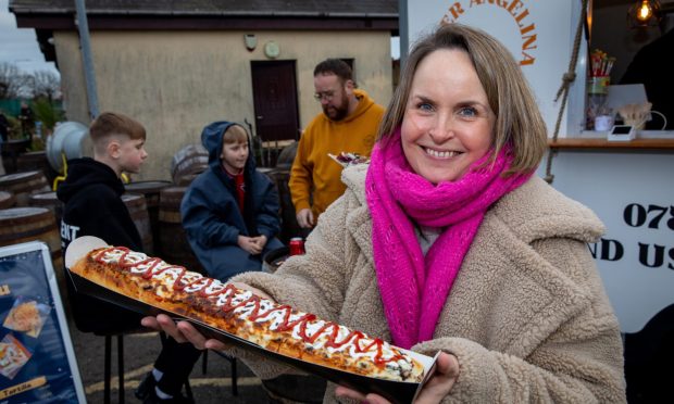 Rachel with a pizza baguette at Doner Angelina Street Food Truck in Dunfermline. Image: Steve Brown/DC Thomson