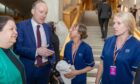 Angus nurses Cathy Fuggaccia and Shona Middleton speak to Labour MSPs Jackie Baillie and Michael Marra in parliament. Image: Steve Brown/DC Thomson