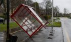 A bus shelter toppled and ripped from its base in Glenrothes. Image: Steve Brown/DC Thomson