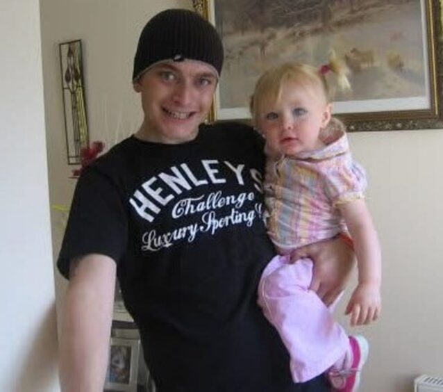 Scott pictured with his daughter Aimee when she was younger. 