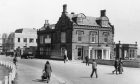 people walk past the Seaforth Hotel in Arbroath