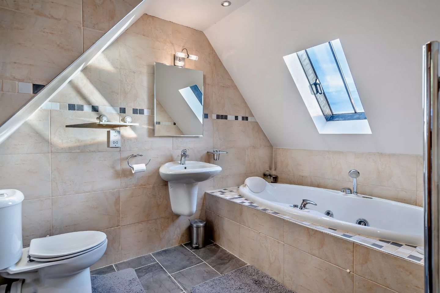 The living accommodation boasts three bathrooms. 