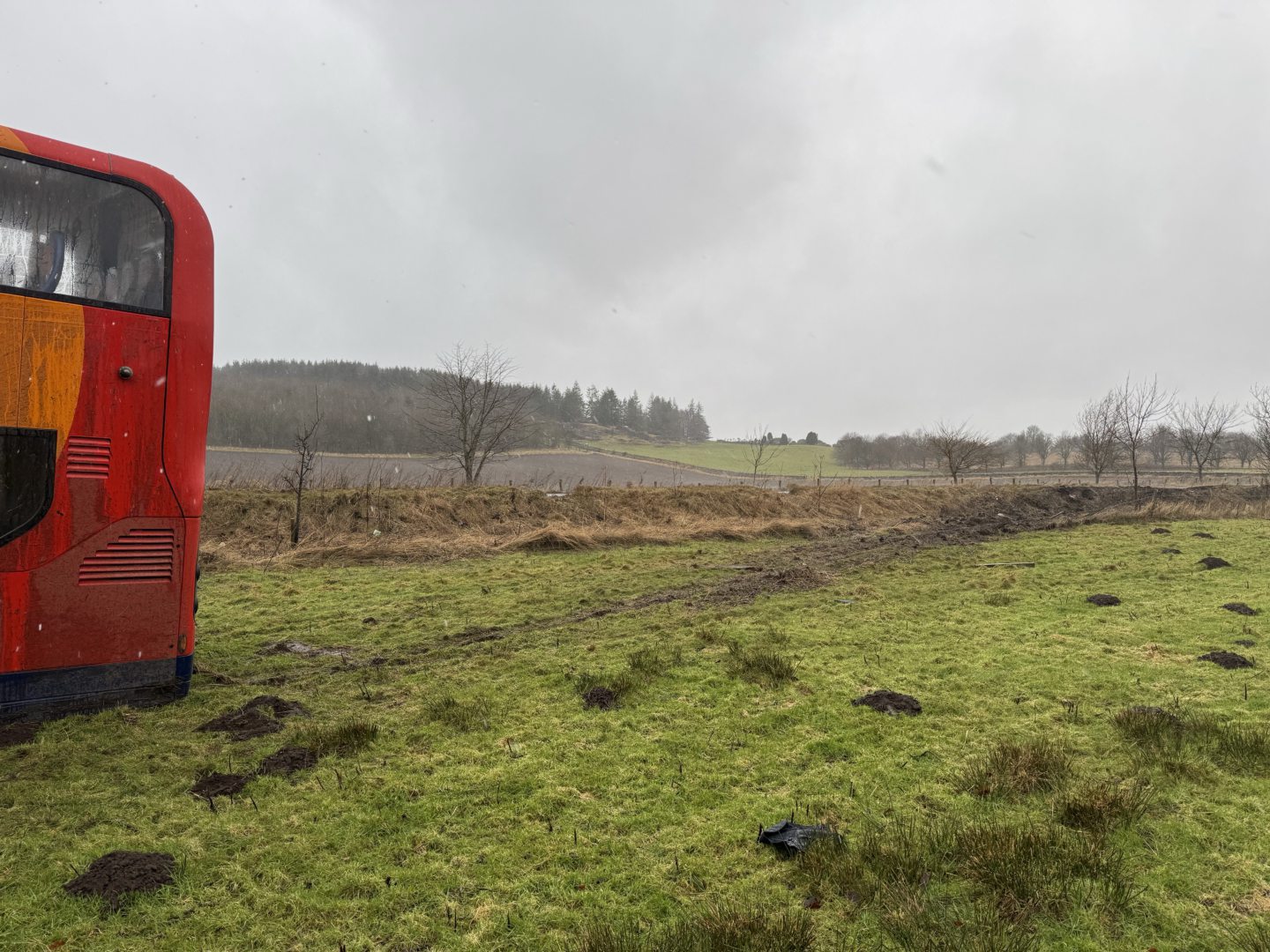 Bus in field.