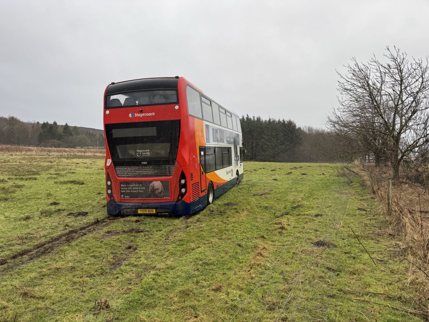 Bus in field.