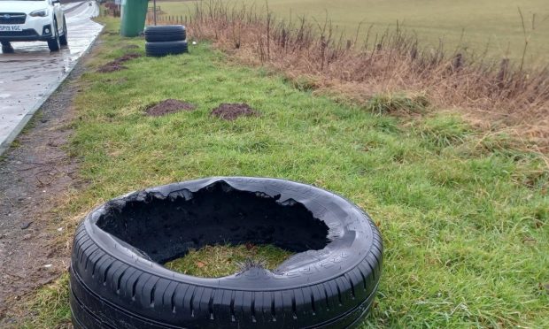 A damaged tyre on the side of the northbound A90 carriageway, north of the A935 Brechin turn-off..