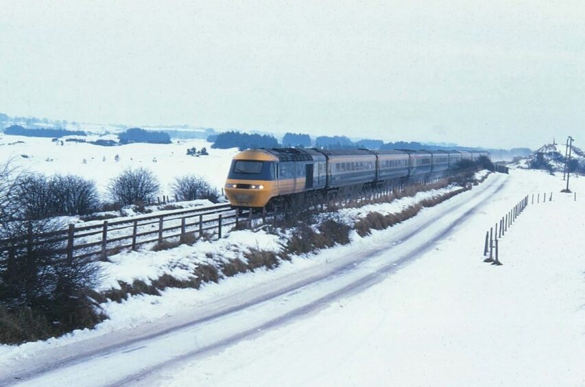 Aberdeen to London Kings Cross InterCity 125 passes Monifieth in the snow of January 14 1979.