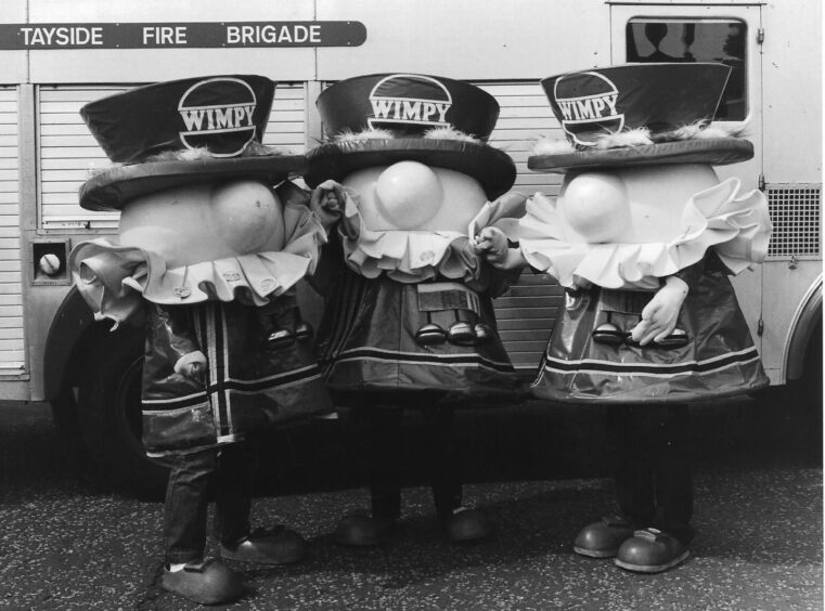 three Wimpy beefeater mascots