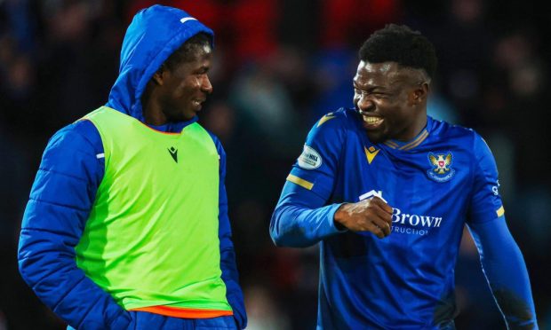 Adama Sidibeh joking with Aaron Essel after St Johnstone beat Motherwell.