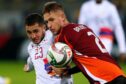 Daniels Balodis playing for Latvia against Armenia.