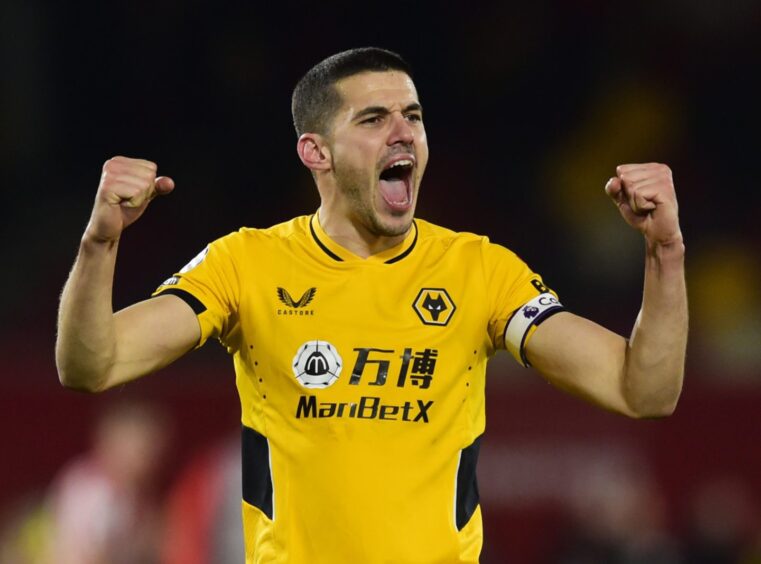 Conor Coady celebrates a Wolves win.