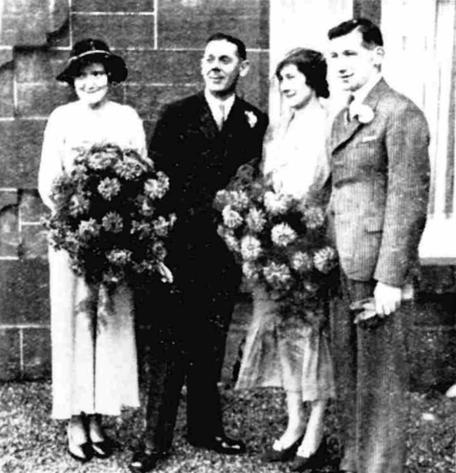 four people pose for a picture at a wedding taking place at the hotel in 1934.