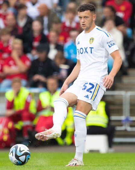 Leeds United defender Kris Moore makes a pass.