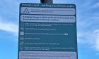 Parking signs at the Saltire Centre in Glenrothes are high on lamp-posts