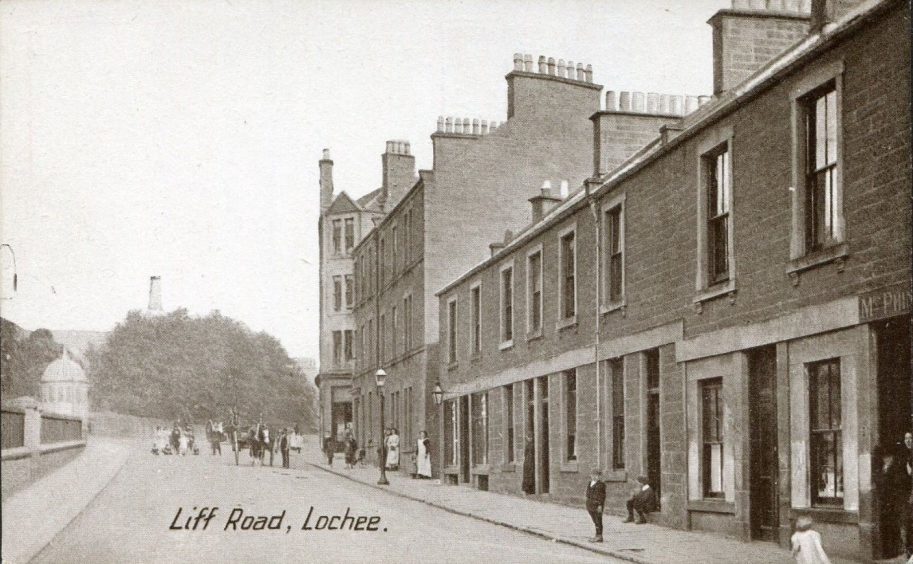 a black and white photo of Liff Road in Lochee in the 1900s