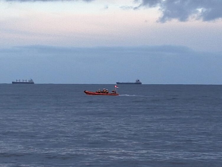 Kinghorn lifeboat searching Kirkcaldy Harbour. 