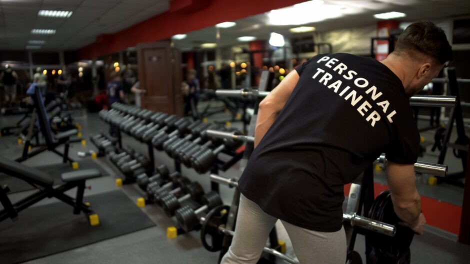 Personal trainer in gym