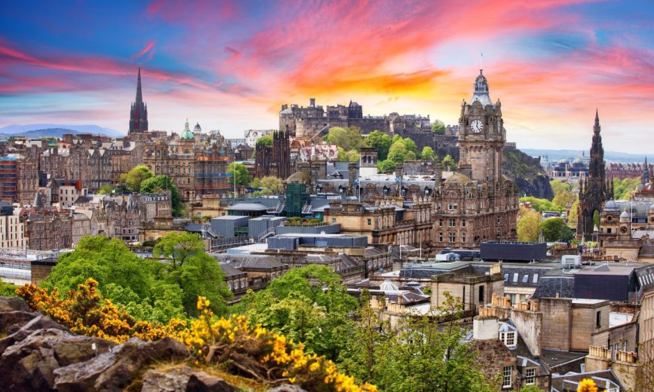 Edinburgh city with castle and sunset