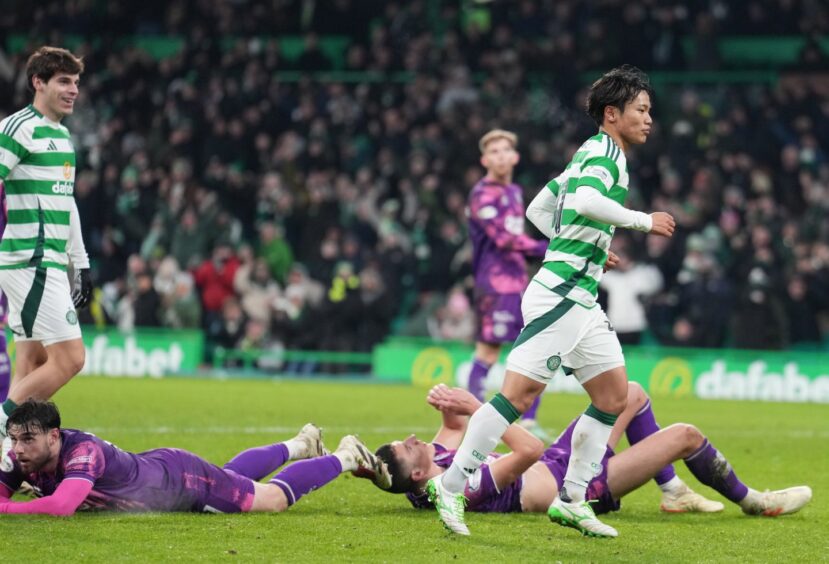 Reo Hatate wheels away after doubling Celtic's lead