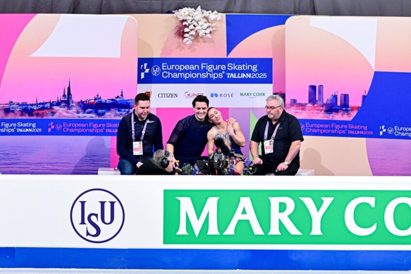 British champions Luke Digby and Ana Vaipan-Law with coach Simon Briggs (right). Image: Raniero Corbelletti/Shutterstock