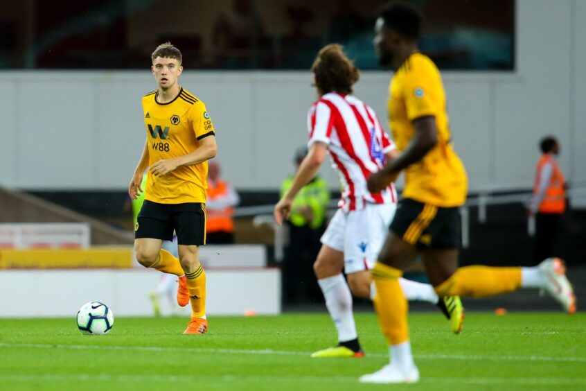 Elliot Watt in action for Wolves against Stoke City.