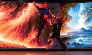 Performers in front of the screen at CoSTAR Realtime Lab at Water's Edge in Dundee. Image: Abertay University