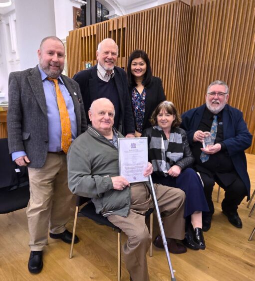 Group of people at award presentation