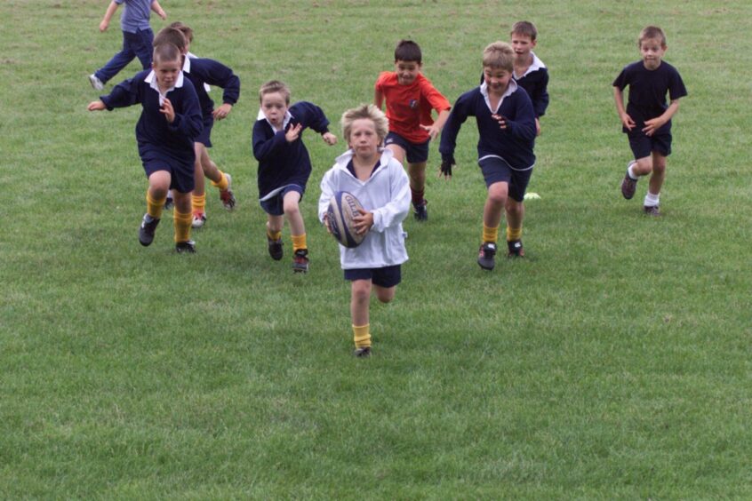 boys taking part in a rugby summer school at Mayfield in August 2003.