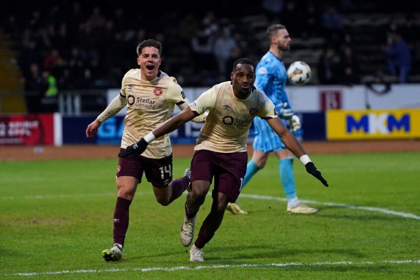 Hearts striker Elton Kabangu wheels away after putting Dundee to the sword. Image: Pete Summers/Shutterstock