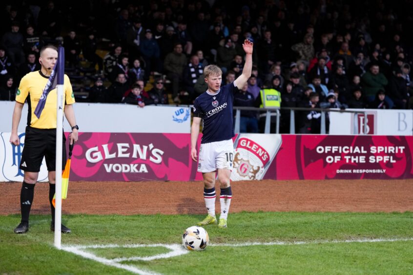 Lyall Cameron lines up a corner kick at Dens Park. Image: Stuart Wallace/Shutterstock