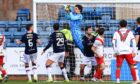 Dundee goalkeeper Jon McCracken performed well against Airdrie. Image: David Young/Shutterstock