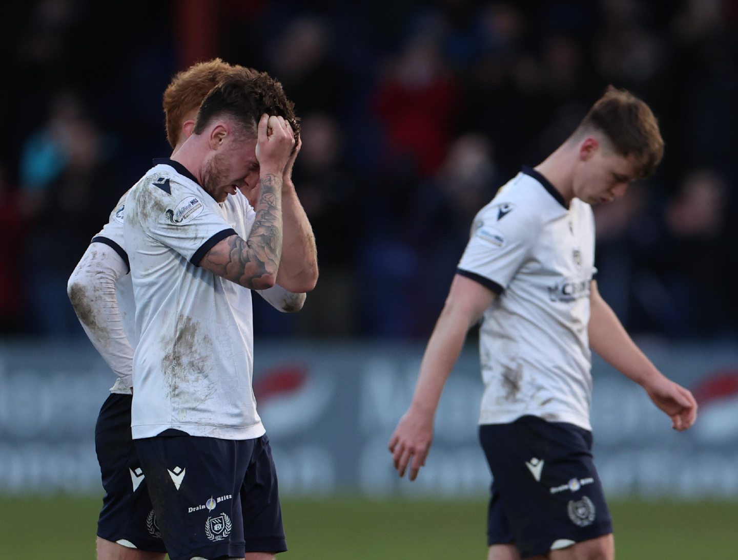 Dundee players distraught in Dingwall