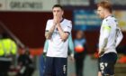 Dundee players after yet another defeat. Image: David Young/Shutterstock