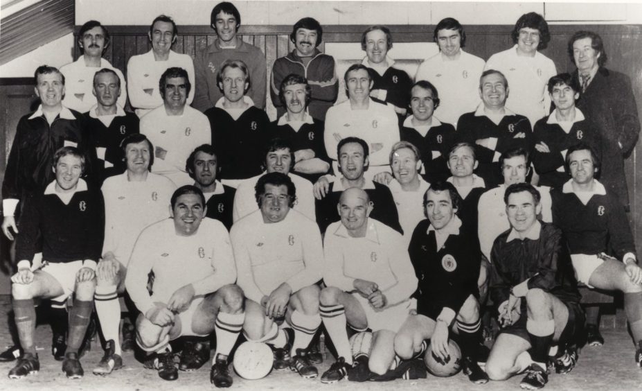 participants in the Dundee old boys game in 1976 line up for a photo