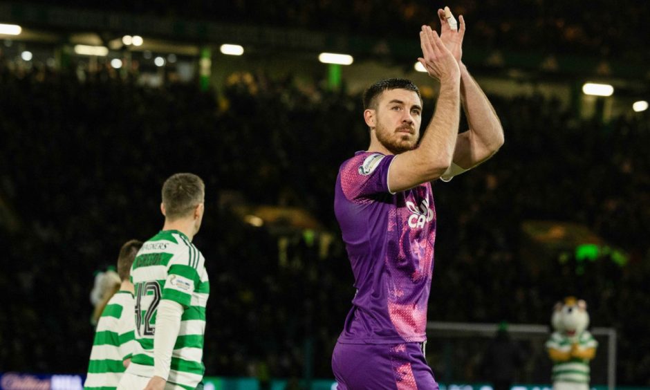 Declan Gallagher salutes the Dundee United fans at Parkhead in January