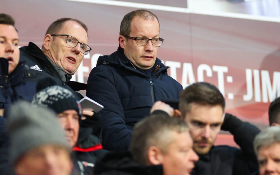 Head of referee operations, Willie Collum, in the stand watching a game.