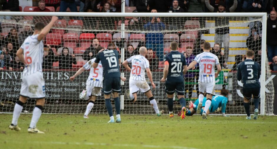 A deflection off Chris Kane puts Dunfermline ahead against Raith Rovers.