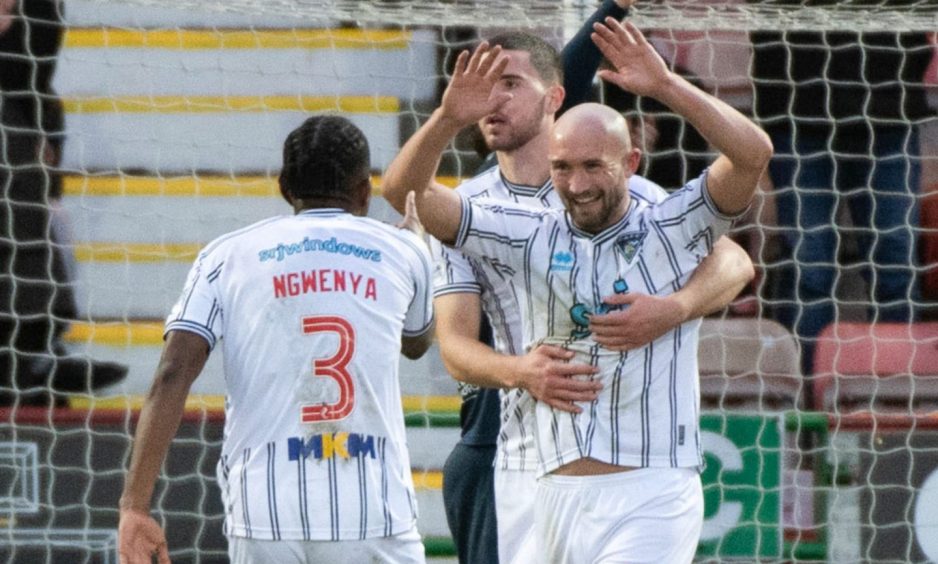 Chris Kane is all smiles after scoring the second of his hat-trick against Raith Rovers.