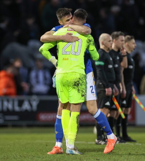 Ross Sinclair celebrates with Bozo Mikulic at full-time.