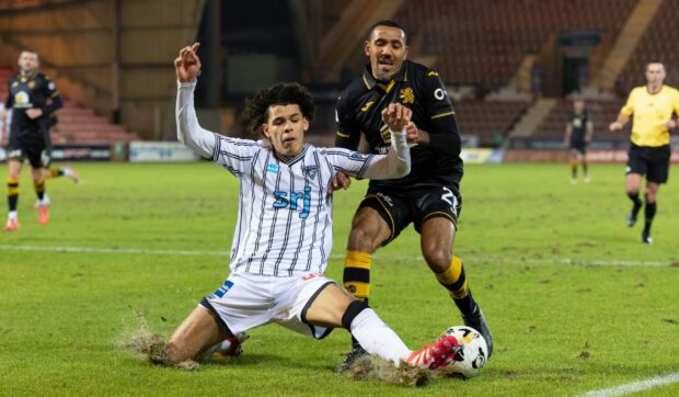 Dunfermline's Scotland U/21 star Jeremiah Chilokoa-Mullen challenges Livingston's Cristian Montano. Image: Ross Parker/SNS