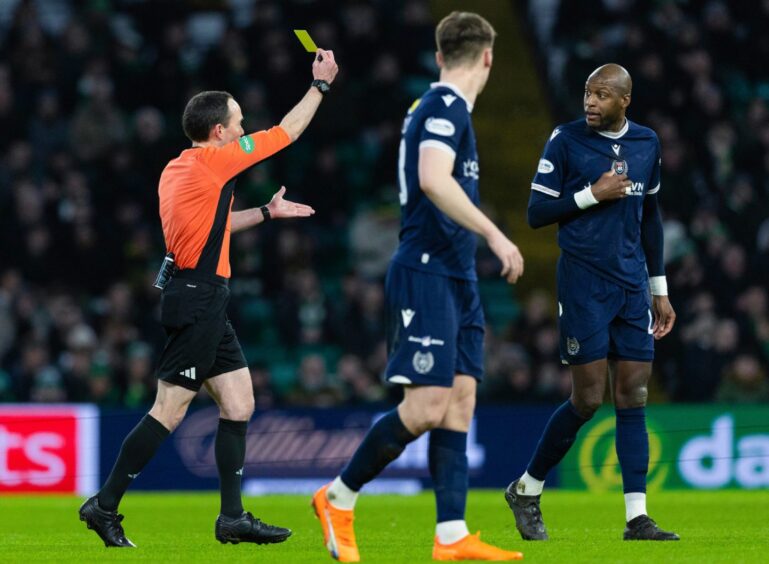 Mo Sylla gets booked after giving away the penalty for the opening goal. Image: Craig Williamson/SNS