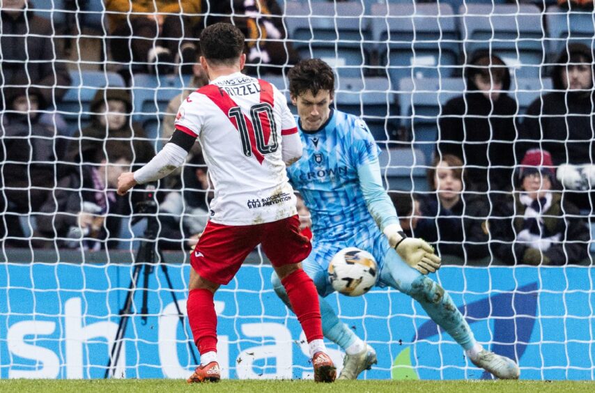 Jon McCracken made a number of key saves for Dundee. Image: Mark Scates/SNS