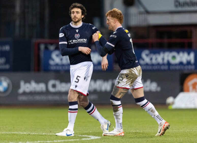 Simon Murray hands over the captain armband as Joe Shaughnessy makes his long-awaited return. Image: Mark Scates/SNS