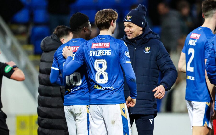 Simo Valakari congratulates Adama Sidibeh after St Johnstone had beaten Hamilton Accies.