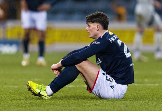 Dundee's Seb Palmer-Houlden looks dejected at full-time against Aberdeen. Image: Ross Parker/SNS