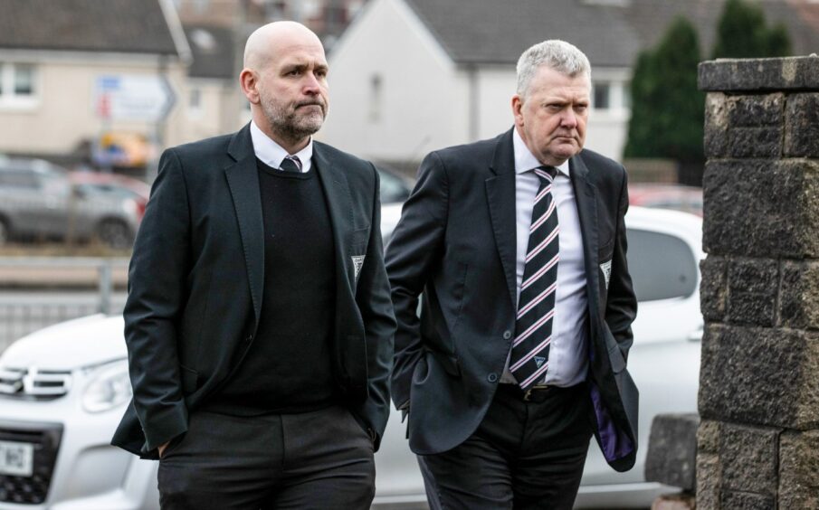 Dunfermline CEO David Cook (L) and board member Drew Main arrive.