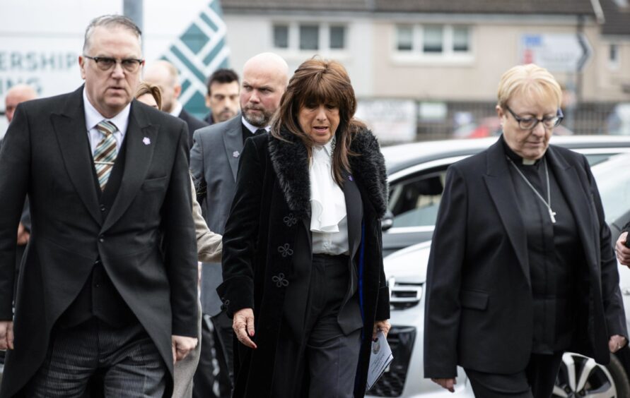 Yvonne Buchanan, partner of Jimmy, arrives at the funeral. 