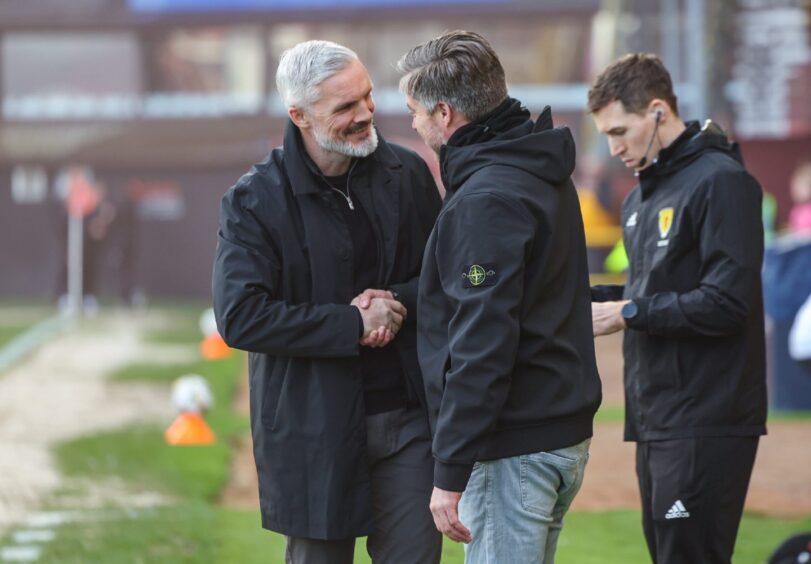 Goodwin, left, welcomes Wimmer to Scottish football.