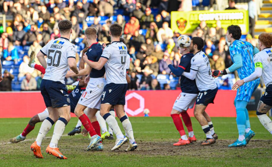 Akil Wright scores a spectacular volley inside the Dundee six-yard box. Image: Euan Cherry/SNS