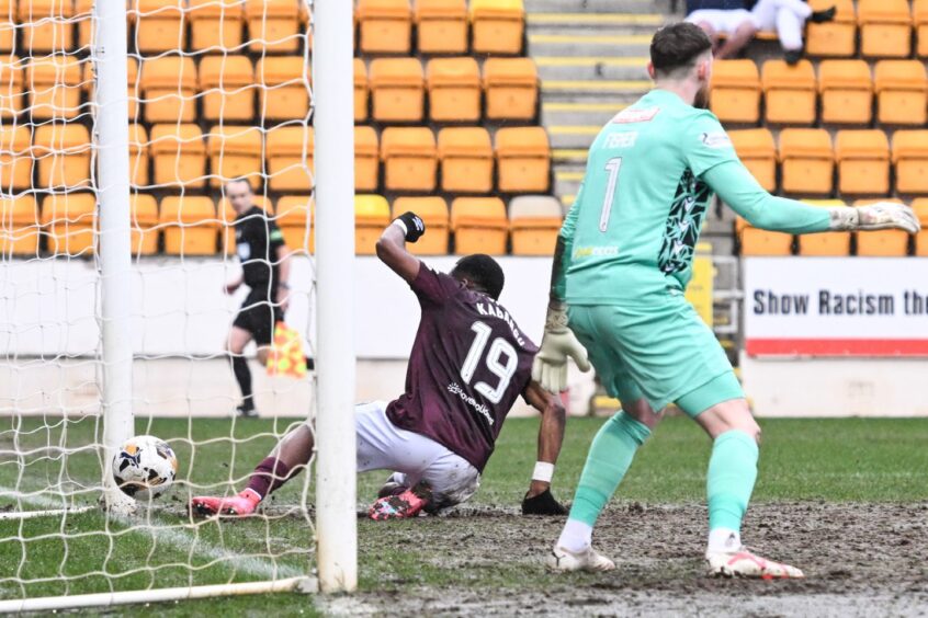 Elton Kabangu opens the scoring.